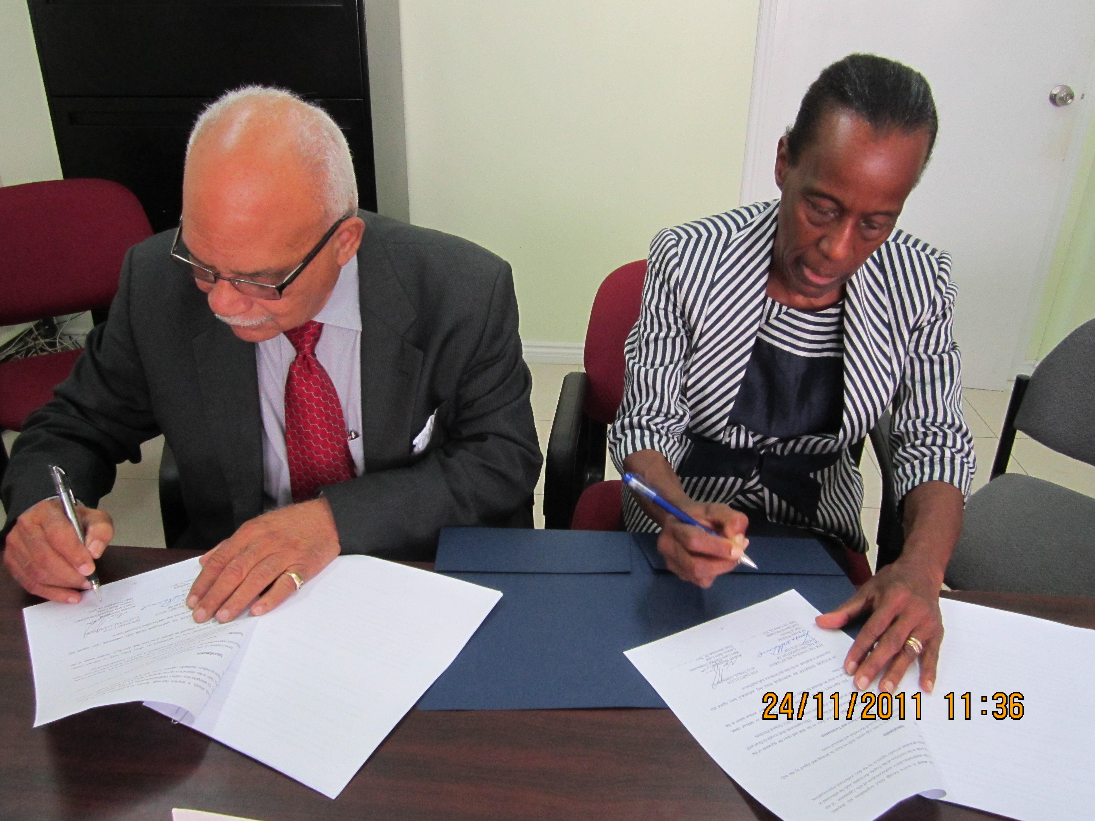 Chief of Mission signs Agreement with Chair Electoral Commission(November 24, 2011)